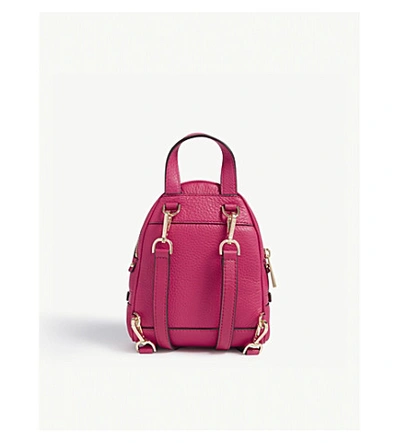 Shop Michael Michael Kors Rhea Extra-small Leather Backpack In Ultra Pink