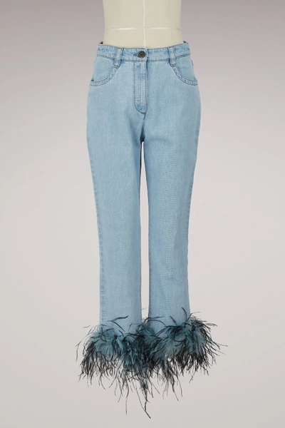 Shop Prada Feathers Denim Pants In Light Blue
