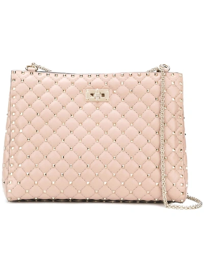 Shop Valentino Rockstud Spike Shoulder Bag In Pink