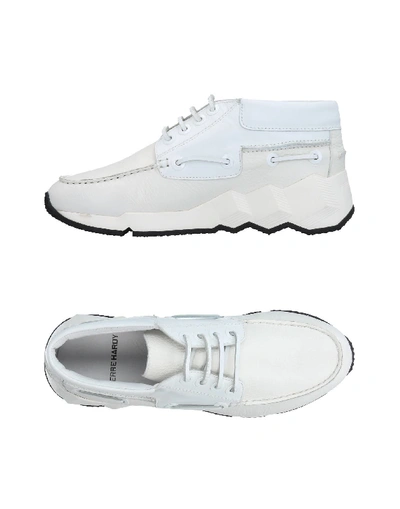 Shop Pierre Hardy Sneakers In White