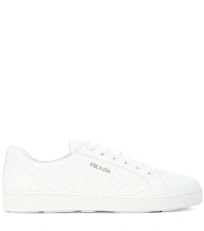 Shop Prada Quilted Leather Sneakers In White