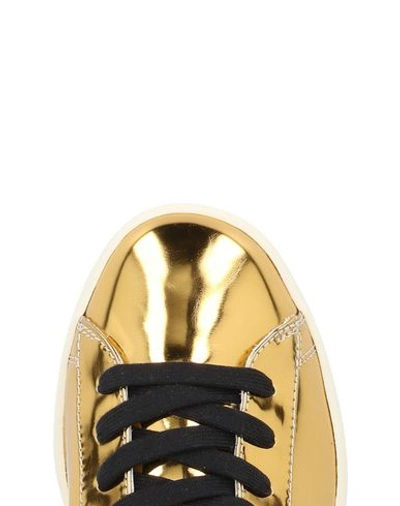 Shop Diesel Sneakers In Gold