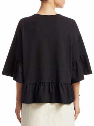 Shop Mcq By Alexander Mcqueen Embellished Ruffle Cotton Bell-sleeve Top In Darkest Black