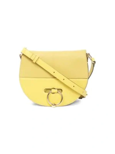 Shop Jw Anderson Pierced Leather Latch Bag In Ash