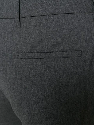 Shop Prada Embellished Hems Trousers In Grey