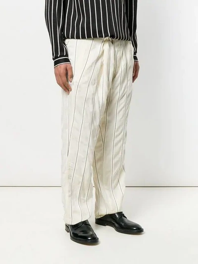 Shop Haider Ackermann High Waisted Buckled Trousers In Neutrals