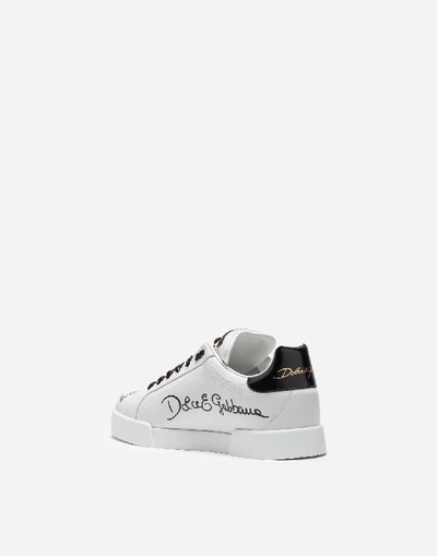 Shop Dolce & Gabbana Portofino Sneakers In Calfskin With Patch And Embroidery In White