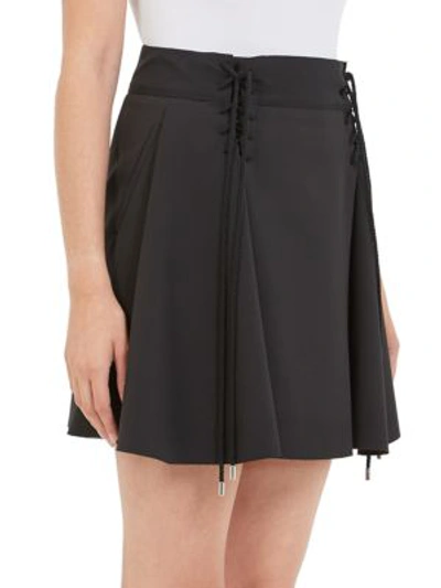 Shop Carven Lace-up Mini Skirt In Noir
