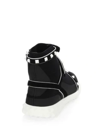 Shop Valentino Rockstud Leather Sneakers In Black White