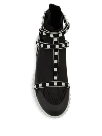 Shop Valentino Rockstud Leather Sneakers In Black White