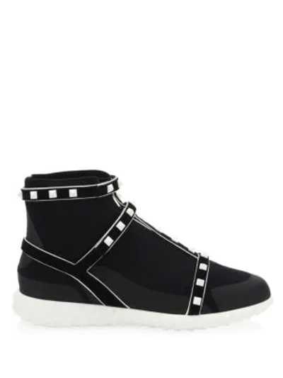 Shop Valentino Rockstud Leather Sneakers In Black White