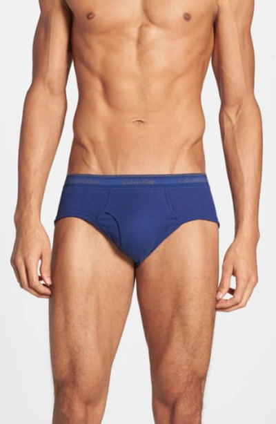 Shop Calvin Klein 4-pack Low Rise Briefs In Blue Assorted