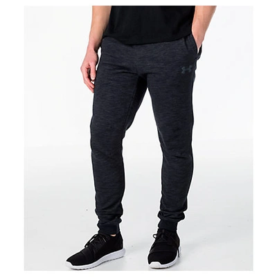 Shop Under Armour Men's Baseline Tapered Jogger Pants, Black