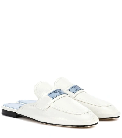 Shop Prada Leather Slippers In White