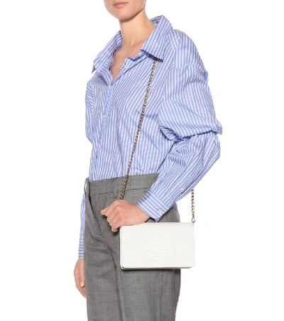 Shop Prada Saffiano Leather Shoulder Bag In White