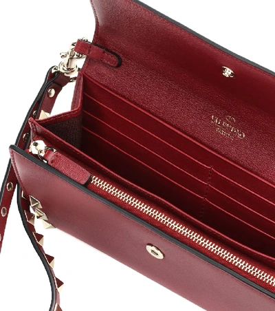 Shop Valentino Rockstud Leather Wallet In Red