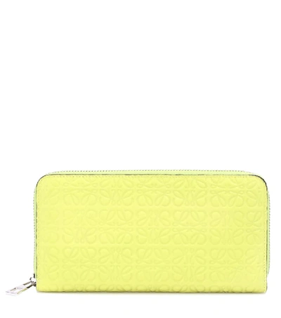 Shop Loewe Zip Around Leather Wallet In Yellow