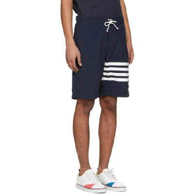 Shop Thom Browne Navy Four Bar Board Shorts In 415 Navy