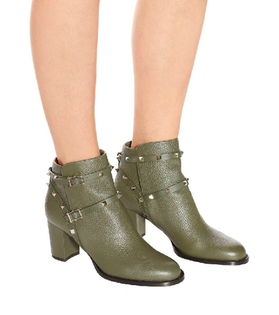 Shop Valentino Rockstud Leather Ankle Boots In Green