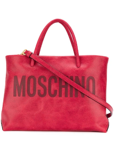 Shop Moschino Embossed Logo Tote Bag