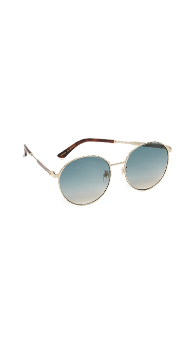 Shop Gucci Sensual Romanticism Round Sunglasses In Gold/blue