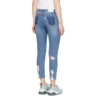 Shop Sjyp Blue Unbalanced Hem Straight-leg Jeans In 0033 Denim
