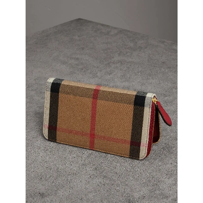 Shop Burberry House Check And Leather Ziparound Wallet In Russet Red