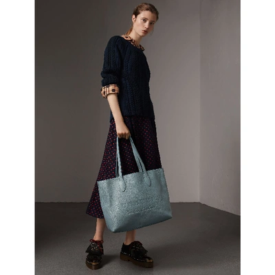 Shop Burberry Embossed Leather Tote In Dusty Teal Blue