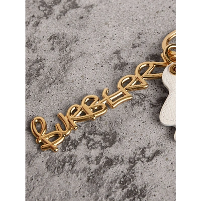 Shop Burberry Doodle Motif Leather Key Charm In Light Gold