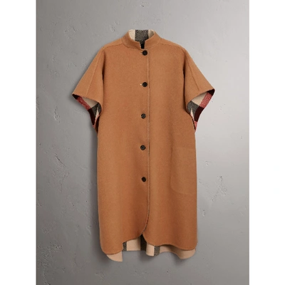 Shop Burberry Reversible Check Wool Blend Poncho In Camel