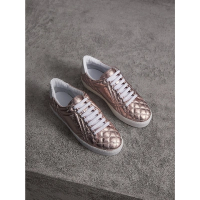 Shop Burberry Metallic Check-quilted Leather Trainers In Metallic Nude