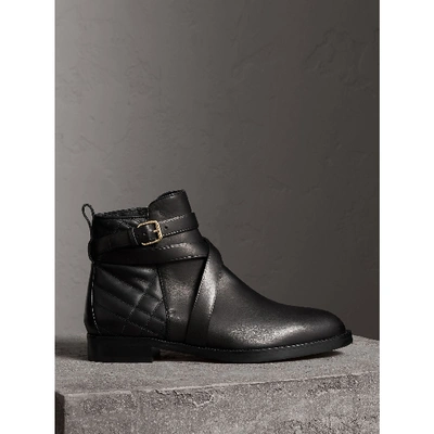 Shop Burberry Strap Detail Quilted Leather Ankle Boots In Black