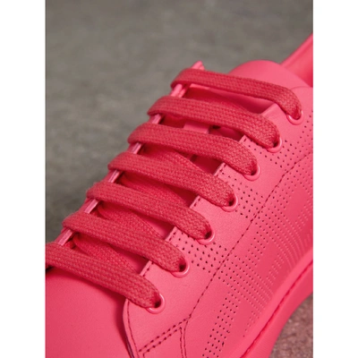 Shop Burberry Perforated Check Leather Sneakers In Neon Pink