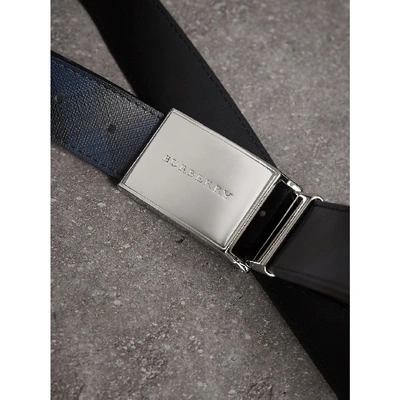 Shop Burberry Reversible London Check And Leather Belt In Navy/black
