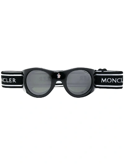 Shop Moncler Round Frame Sunglasses In Black