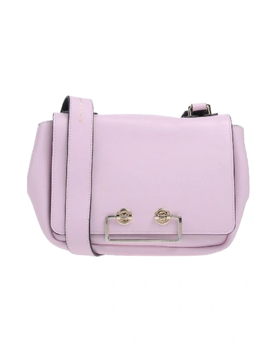 Shop Coccinelle Cross-body Bags In Pink