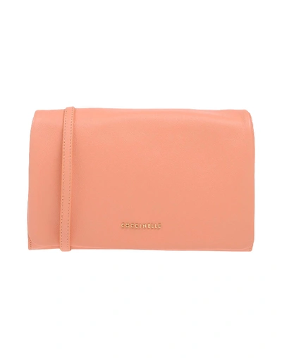 Shop Coccinelle Handbags In Salmon Pink