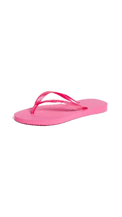 Shop Havaianas Slim Flip Flops In Shocking Pink