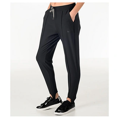 Shop Nike Women's Dry Gym Stirrup Training Pants, Black