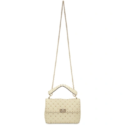 Shop Valentino Ivory  Garavani Medium Quilted Rockstud Spike Bag In I16 Ivory