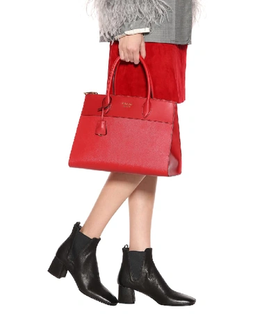 Shop Prada Paridgme Leather Shoulder Bag In Red