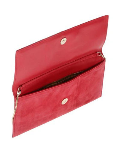 Shop Versace Handbags In Red