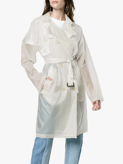 Shop Prada Transparent Trench Coat In White