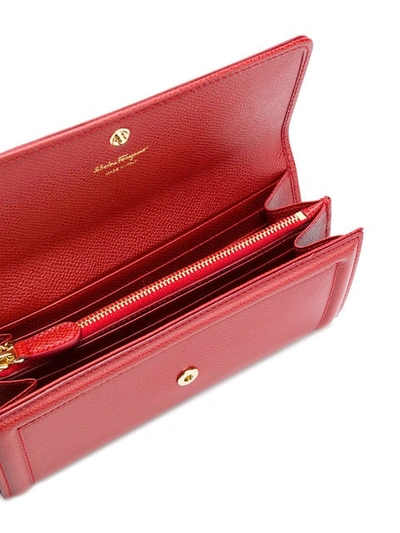 Shop Ferragamo Vara Flap Wallet In Red