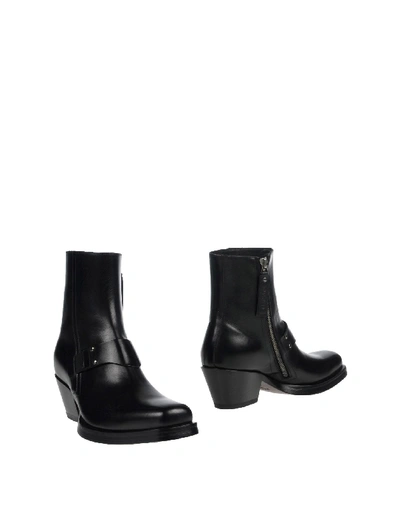 Shop Versace Boots In Black