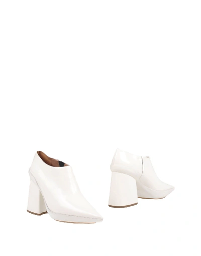 Shop Marni Booties In White