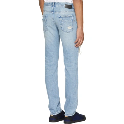 Shop Fendi Blue Slim Ff Logo Jeans In F0uv2