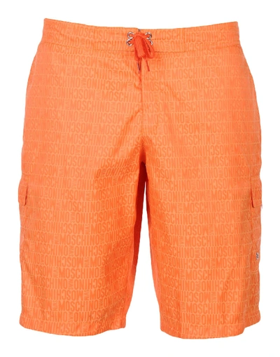 Shop Moschino Swim Swim Trunks In Orange