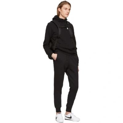 Shop Nike Black Rally Hoodie In 010 Black