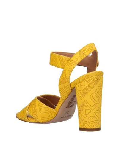 Shop Love Moschino Sandals In Yellow